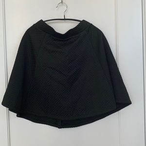 high-waisted black short skirt